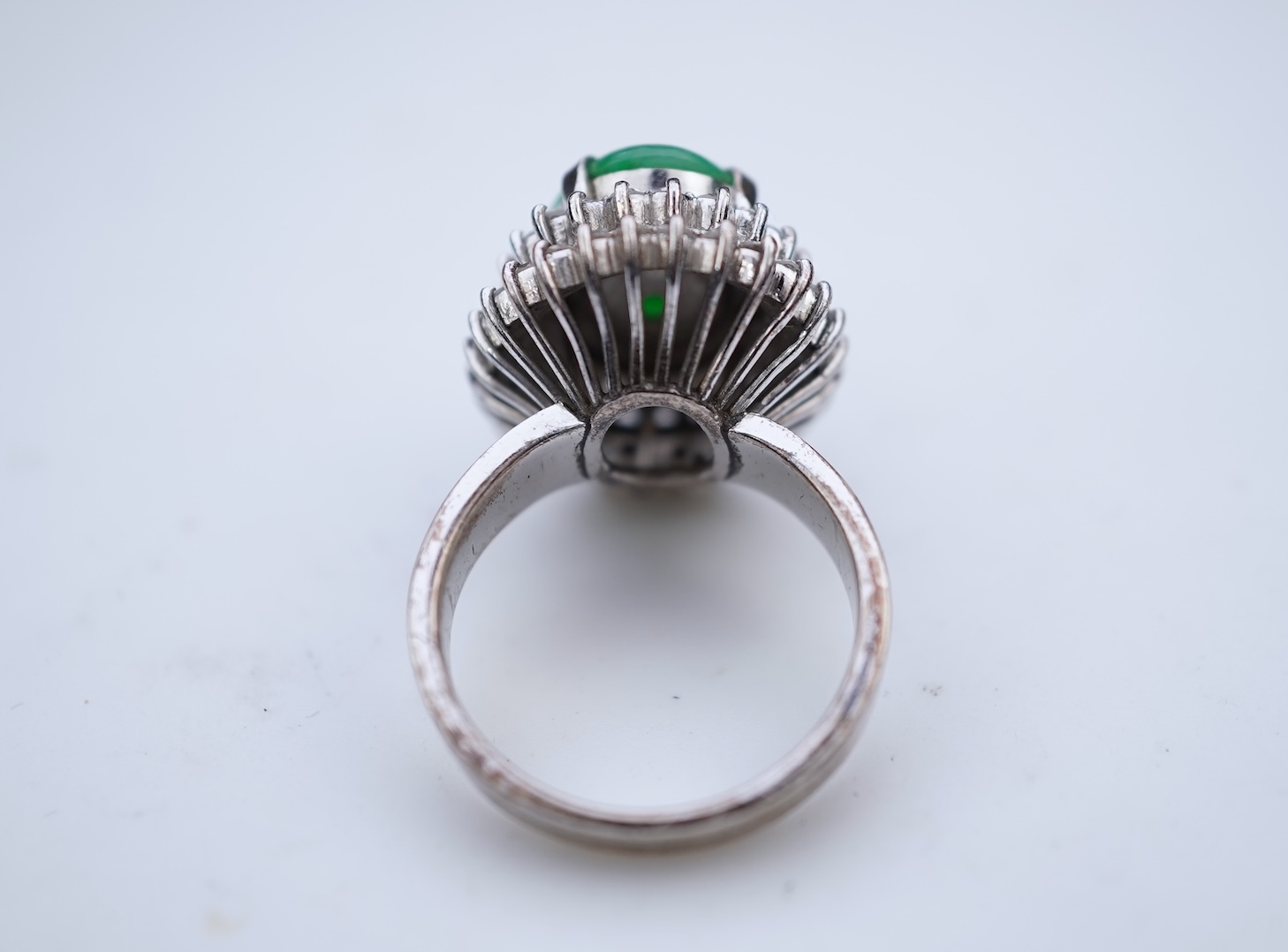 A jadeite and diamond ring